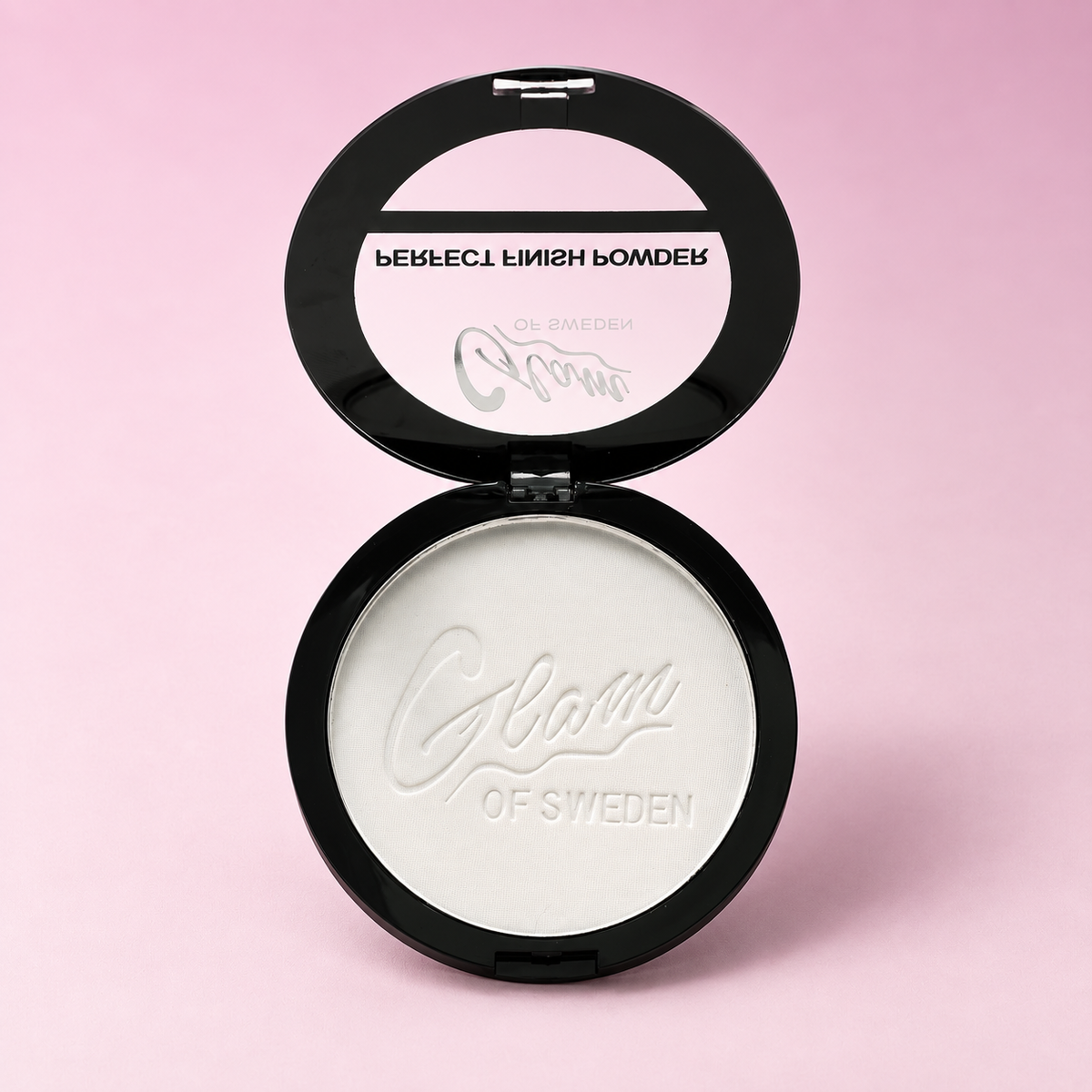 Perfect Finish Powder Clear H01485 — boîtier ouvert sur fond rose
