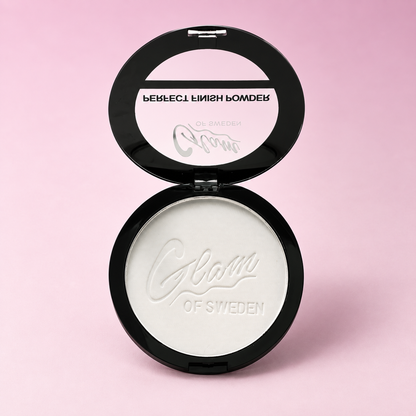 Perfect Finish Powder Clear H01485 — boîtier ouvert sur fond rose