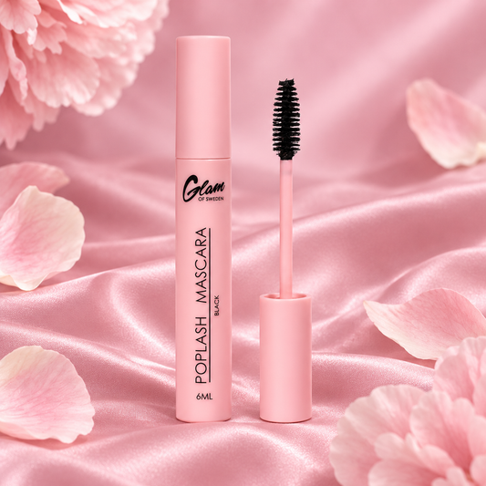 Mascara Poplash Noir et sa brosse sur satin rose