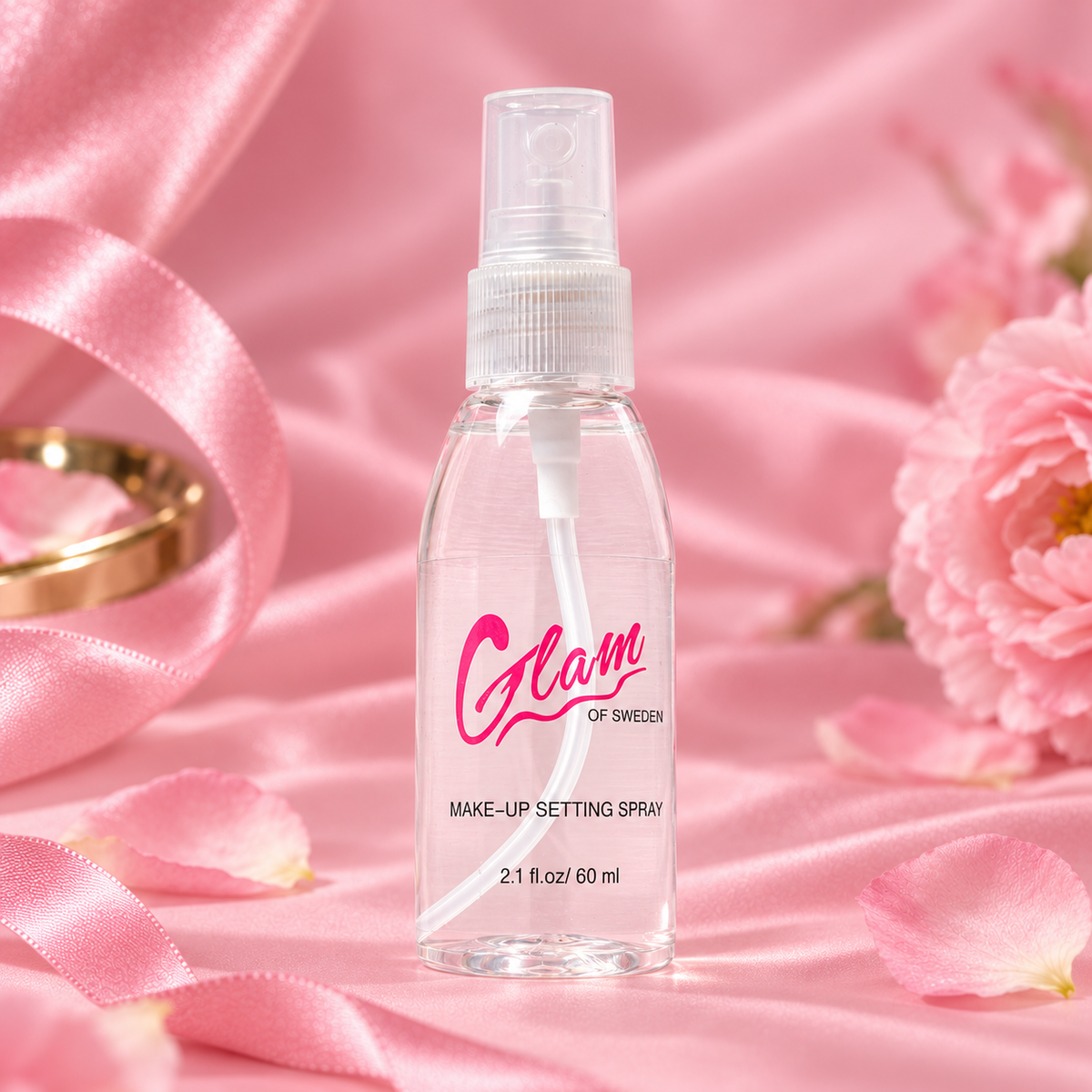 Spray Fixateur Glam of Sweden 60 ml sur fond rose satiné